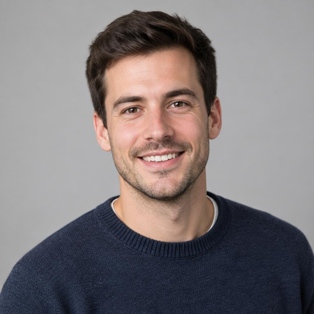 Studio portrait of a young Swiss man, interior design writer, friendly expression